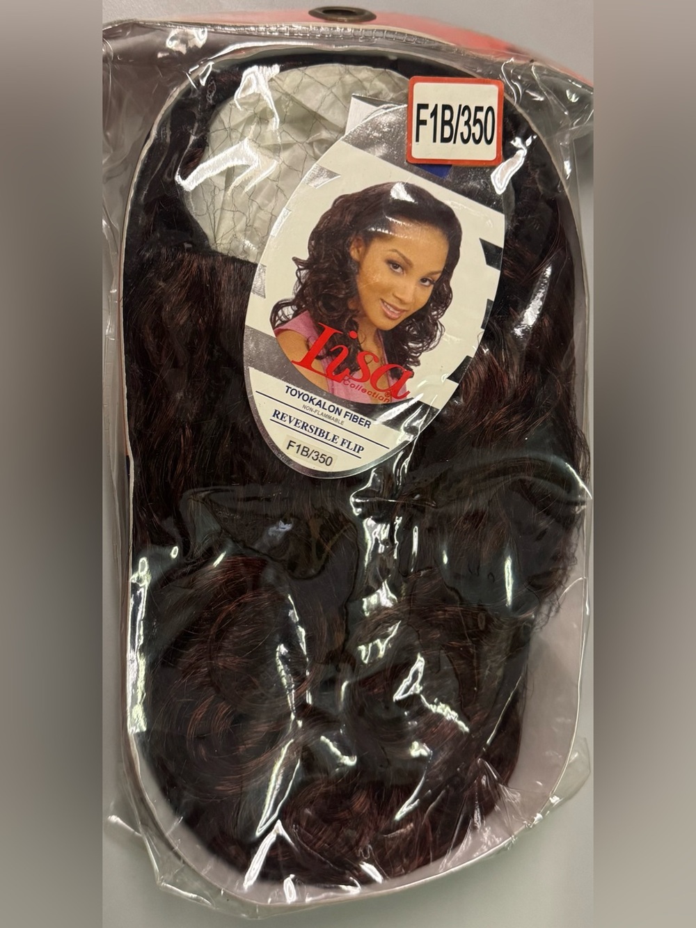 Lisa collection. 100% toyokalon hair (synthetic). Half wig.
